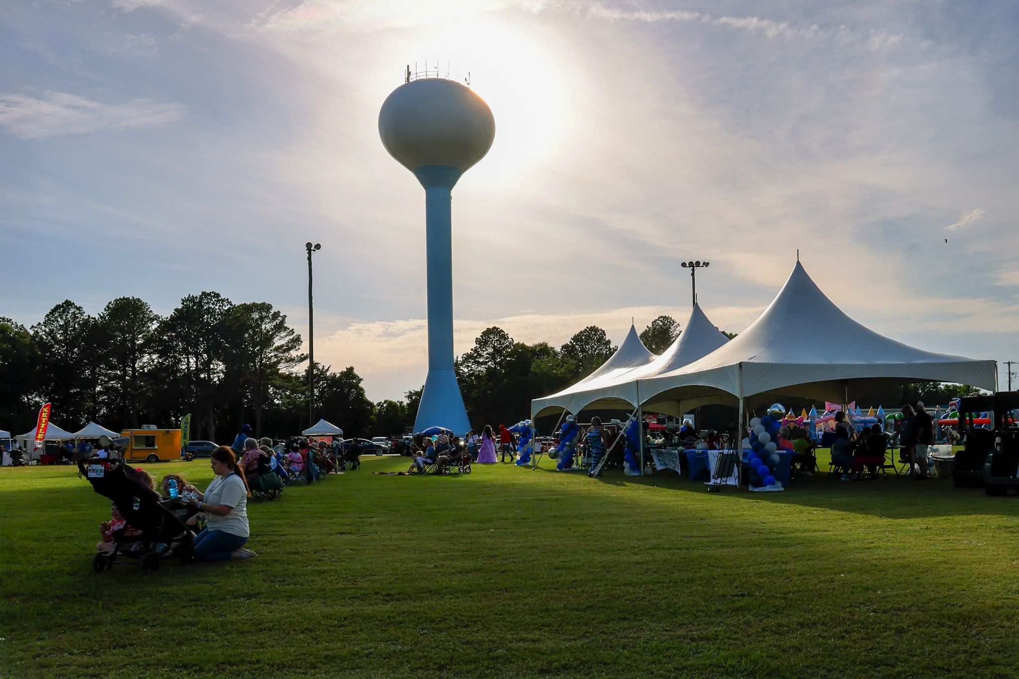 Warner Robins community gathering beneath the city water tower